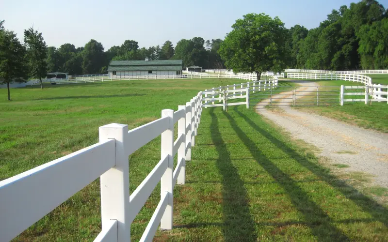 white-agriculture-fence-at-farm-house